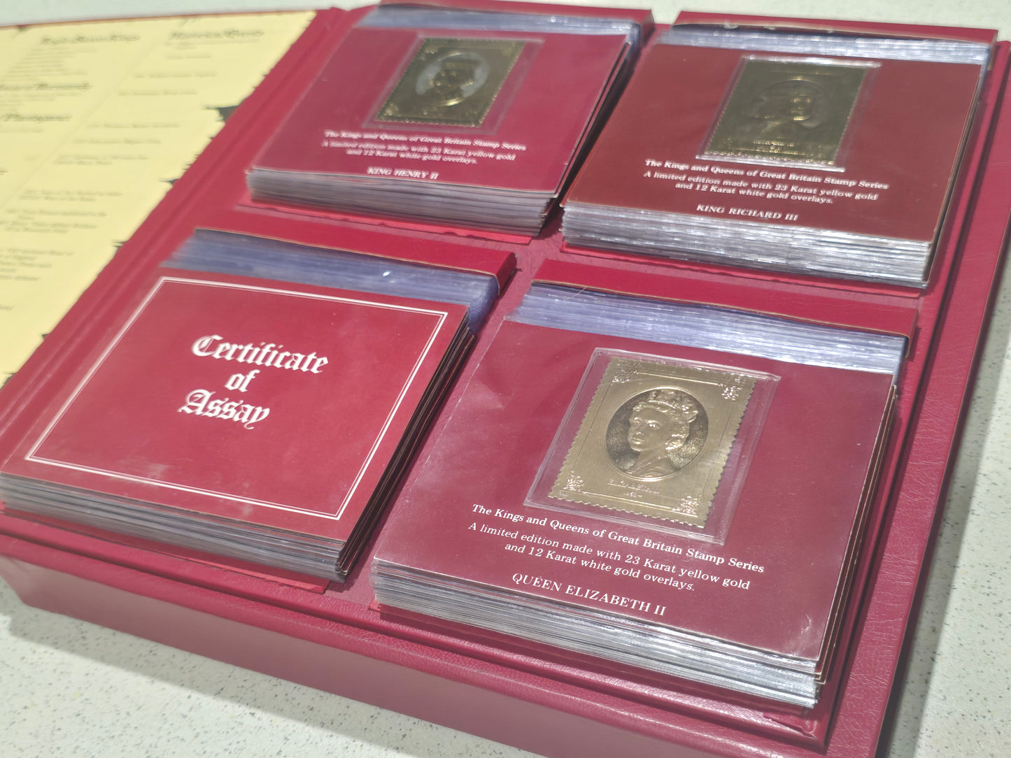 The King and Queens of Great Britian, 23k gold plated stamp set (49pc)