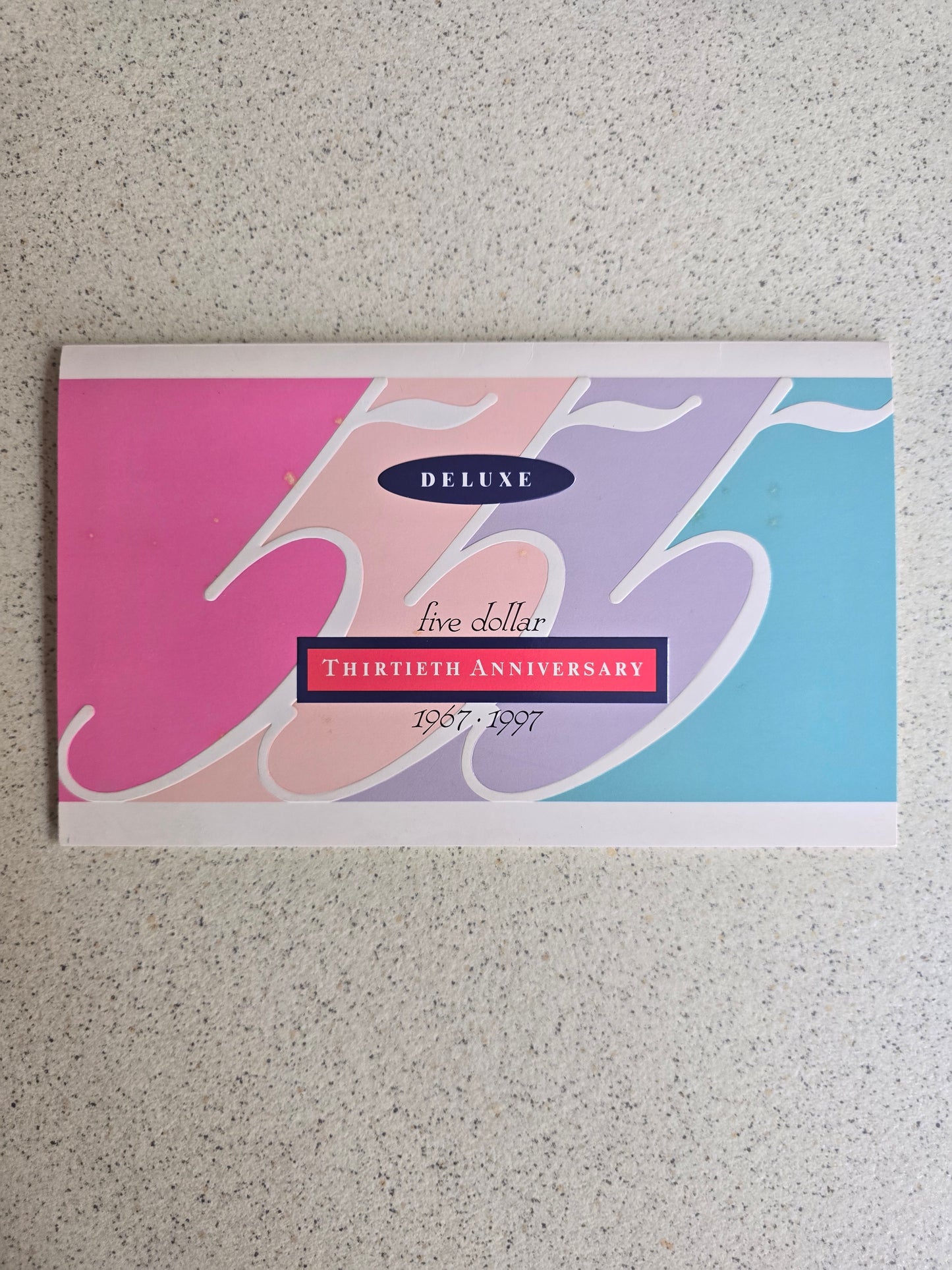 30th Anniversary of $5 note 1997 folio (black serial)