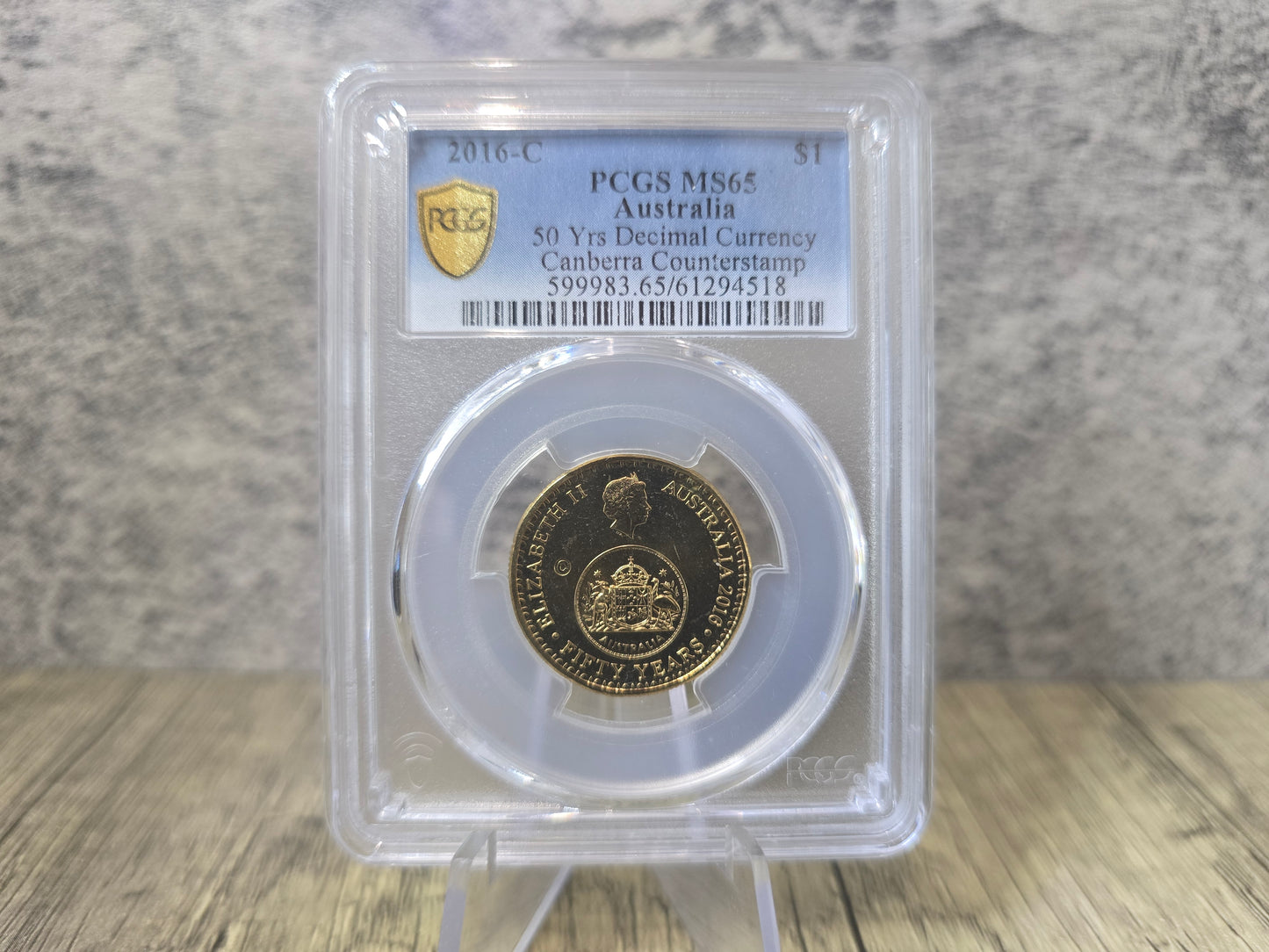 2016 $1 Changeover C-Counterstamp (Enlighten) MS65