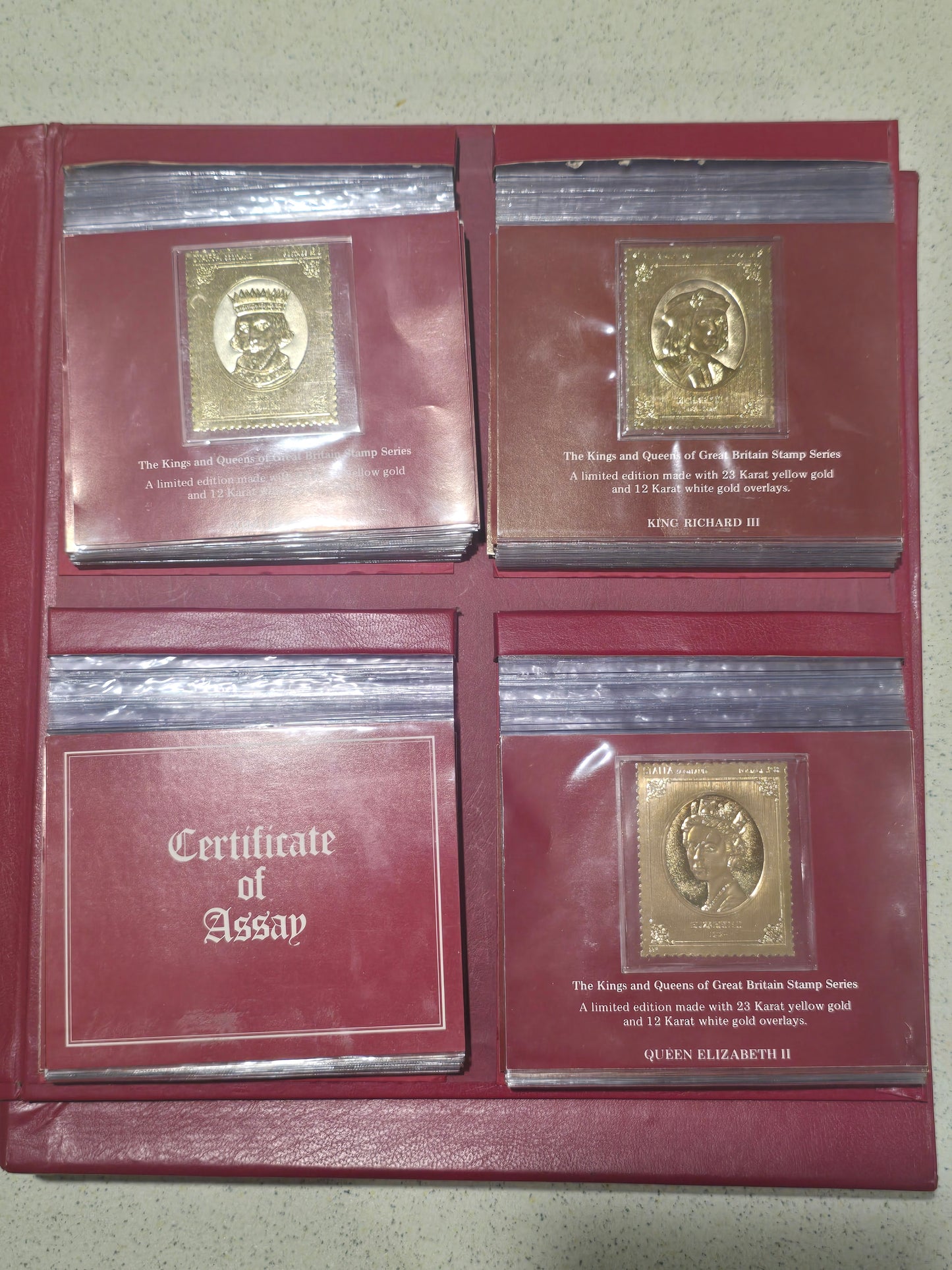The King and Queens of Great Britian, 23k gold plated stamp set (49pc)