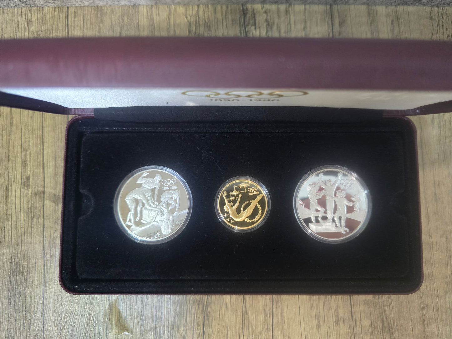 1993-1996 IOC Olympic Centenary, 16.97g Gold + 2oz silver, 3 coin proof set